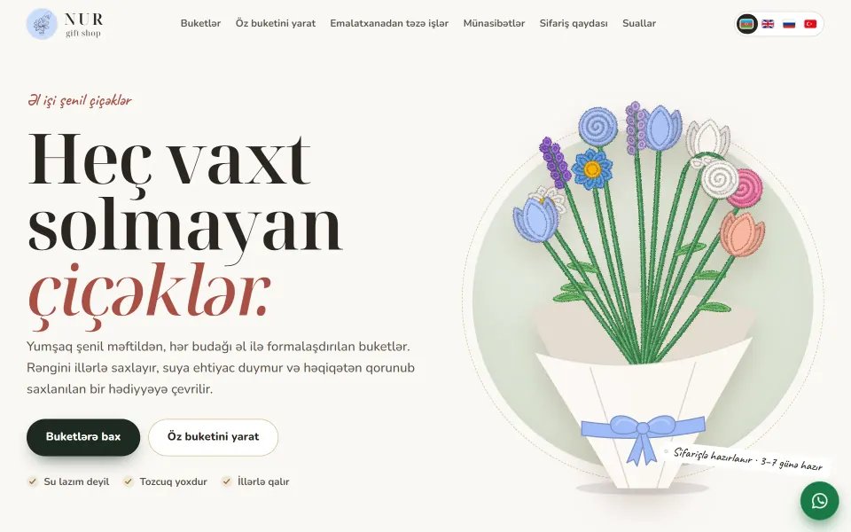 Home page of the NUR gift shop website: a bouquet of handmade chenille flowers and the headline Heç vaxt solmayan çiçəklər