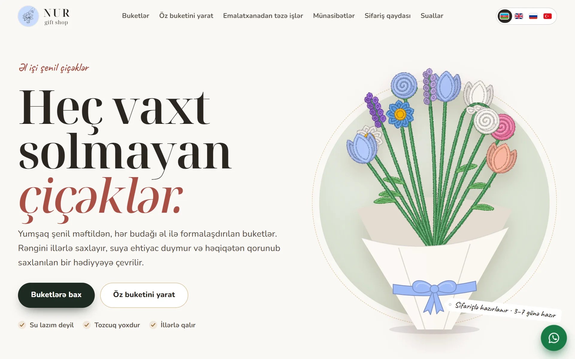 Home page of the NUR gift shop website: a bouquet of handmade chenille flowers and the headline Heç vaxt solmayan çiçəklər
